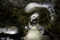 Stream running along the rock wall in the Klutert Cave