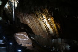 Colorful illumination of the stalactites in Baumann’s Cave