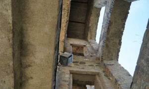 Illuminated stone wall of Greifenstein Castle in daylight