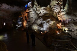 Colorful light accents create atmosphere in the Prometheus Cave