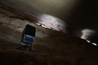 LED spotlight aimed upward to illuminate the cave ceiling