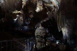 Rock formation with multicolor LED lighting in the Prometheus Cave