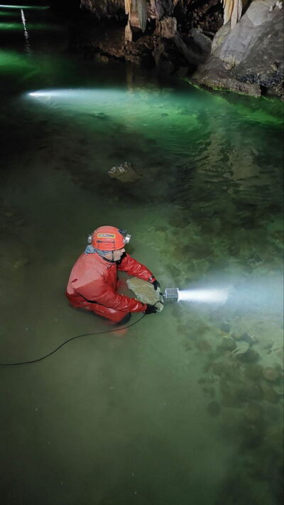 Water section in a cave during a Slovak lighting project