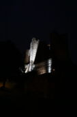 Night portrait of the towers of Castle Greifenstein with LED lighting
