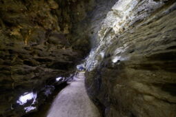 Light reflections on water and rock surface in the Klutert Cave