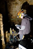 Technician laying LED cable system in Baumann’s Cave