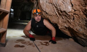 Installation of LED spotlights on the rock wall in Coves de Sant Josep